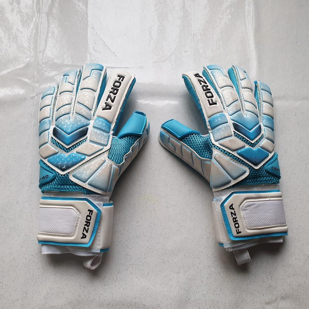 Used only a couple of times for indoor court football, so still in like new condition. Selling as no longer needed.

Forza Goalkeeper Gloves - Adult Size 8. Carry bag included.

3.5mm cyan latex ProGrip palm, fingerspine protection, and an Air Mesh body for airflow.

• Removable Fingerspine protection and dexterity
• Wrap thumb
• Reinforced stitching
• Suitable for use in all weather conditions
• 3.5mm cyan latex ProGrip palm with silicon inner-grip print
• Latex backhand
• Air Mesh body and laminated comfort foam
• Wrap around wrist strap for comfortable fit
• Includes a carry bag

£10 for collection, or £15 for delivery via Royal Mail 2nd Class Signed For.