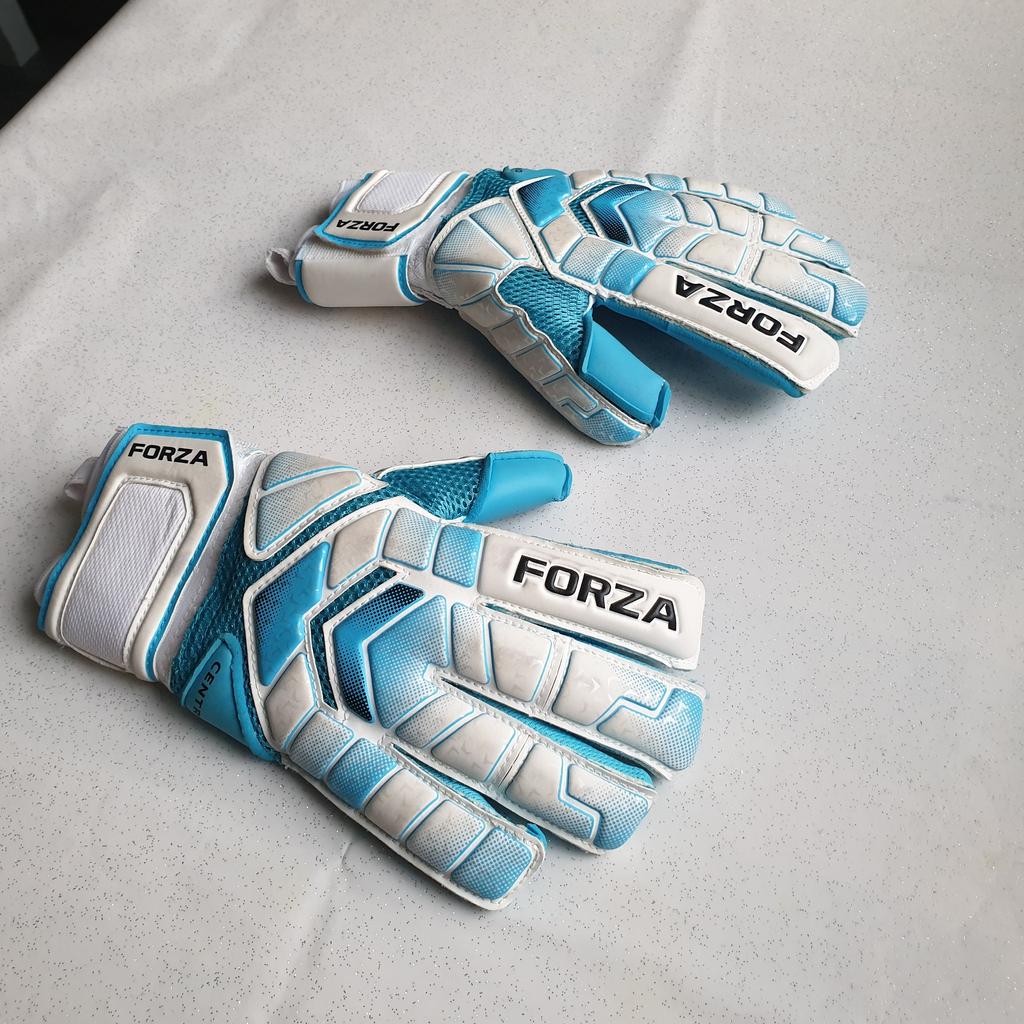 Used only a couple of times for indoor court football, so still in like new condition. Selling as no longer needed.

Forza Goalkeeper Gloves - Adult Size 8. Carry bag included.

3.5mm cyan latex ProGrip palm, fingerspine protection, and an Air Mesh body for airflow.

• Removable Fingerspine protection and dexterity
• Wrap thumb
• Reinforced stitching
• Suitable for use in all weather conditions
• 3.5mm cyan latex ProGrip palm with silicon inner-grip print
• Latex backhand
• Air Mesh body and laminated comfort foam
• Wrap around wrist strap for comfortable fit
• Includes a carry bag

£10 for collection, or £15 for delivery via Royal Mail 2nd Class Signed For.