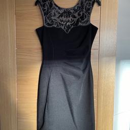 Lipsy Black Bodycon Dress with full working zipper and sequin detail on the front at the top. Ruched in the perfect places on the front.
Size 10
Good condition