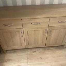 Large cabinet with three drawers and three cupboards. In good condition however there is one leg that has got damage but does not notice in My Home see photos