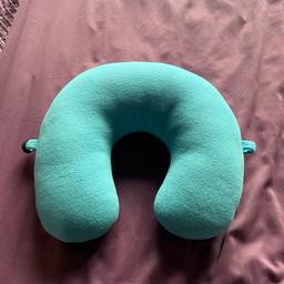 Travel pillow neck support in blue with fastener at the side so you can fasten on to a bag etc
Good condition but the cover has a zip underneath so can be removed for washing. Only used a couple of times