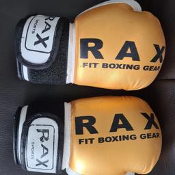 RAX Children's Boxing Gloves in excellent condition. Selling as they no longer fit my son. Originally bought for £12.