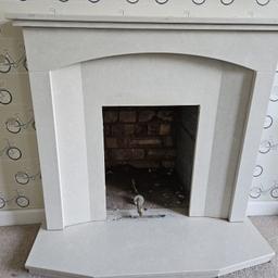 COLLECTION ONLY PLEASE
Cream marble fire surround in great condition. Comes in 3 separate sections the surround, hearth, and mantle.
There is some adhesive on the areas you will not see when it is put back in place otherwise in perfect condition no chips or cracks.
Surround H approx with top on 88cm W94cm 
Hearth L 102cm W 39cm at furthest point.