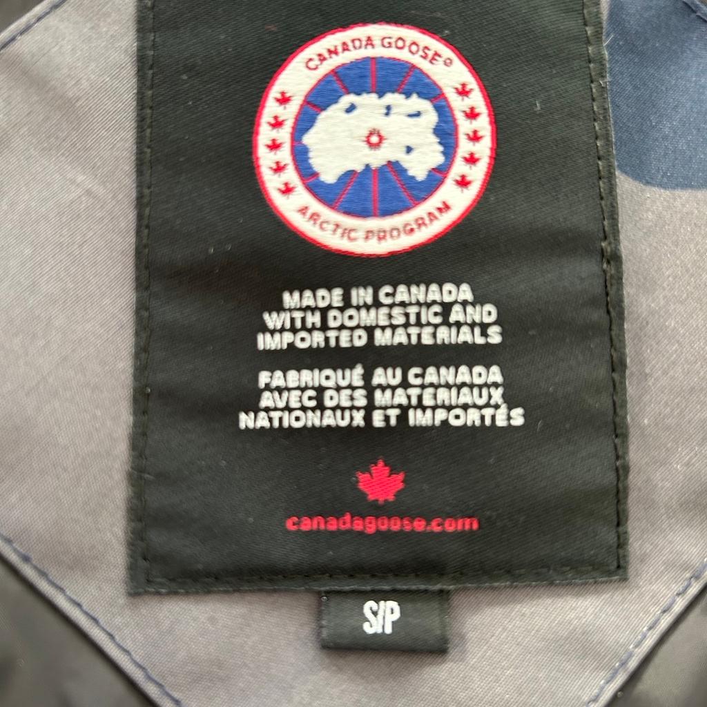 Selling my Authentic Canada Goose Camouflage gilet. Excellent condition, size small (S/P) but will suit a medium person. Navy,Grey Camouflage pattern no marks or damage looks brand new

I would normally buy medium but Canada Goose's outerwear is cut on the large side to accommodate layering.