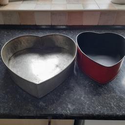2 heart shaped  cake tins
used but good condition
