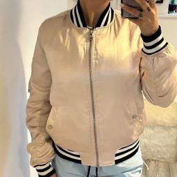 BRAND NEW NEVER WORN (no tags) || topshop shiny silky bomber jacket 

Size 10
(Im a size 10 and 5”5 for reference)

Original price: £60
My price: £30

✨very unique bomber jacket u wont find one like this anywhere anymore
✨silky soft material inside and out 
✨black and white detail 
✨deep pockets and cute zips on sleeves

🚙free uk delivery 
✈️message me for international shipping 

#coat #bomberjacket #silk #topshop #unique satin detail material quality ootd outfit fashion style fashionable stylish black white zip short long crewnneck round neck long sleeves coat silver fash high street open to offers price discount cheap deals