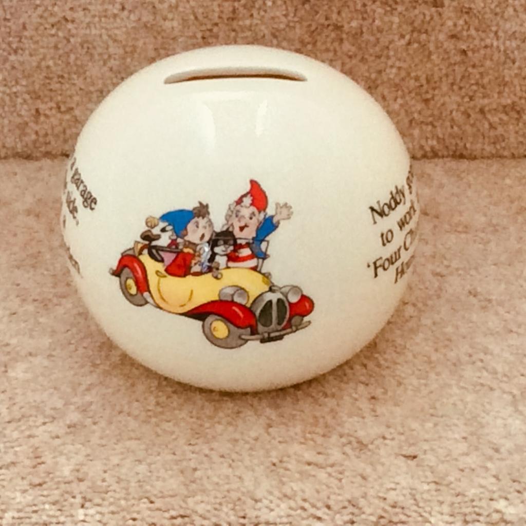 Noddy Money Box
Made by Royal Stafford
Noddy was a character created by the author Enid Blyton.
Wording on the side of the box describes this scene “Noddy goes to work at 'Four Chimney House'.
It has a garage at the side and a flower garden".
Dimensions:36.3 x 24.1 cm /14.3 x 9.5 inches
No chips or cracks or imperfections.
Pet free/smoke free home
Excellent condition

No PayPal payments or bank transfers.
No couriers or posting items, no offers
Cash on collection from B90 only