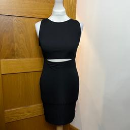 New with tags, size 10, colour black, RRP £19.99

Open above stomach
Sleeveless

Measurements
Pit to pit approx 16 inches
Waist approx 26 inches
Length shoulder to hem approx 33 inches

Material: 97% Polyester 3% Elastane

#ladiesdress #dress #bodycondress #adiesbodycondress #topshop