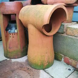 As seen in the picture 1 new clay chimney pot wit built in rain cover for sale at a fraction of the cost new.