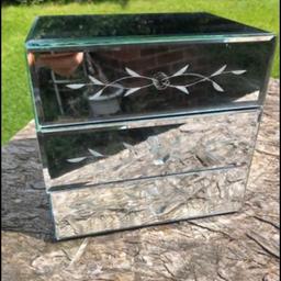Gorgeous next jewellery box. Pretty engraved glass with three drawers that pull out. Crystal knobs one is missing but still opens the drawer . Lovely item . From next was £30.