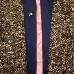 Brand New Girls Nike Tracksuit Bottoms. Size girls XL to fit ages 13-15 years old.