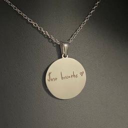 billie eilish necklace
handmade
engraved with billies handwriting in her quote “just breathe”
perfect for any billie fan!!! 🩶