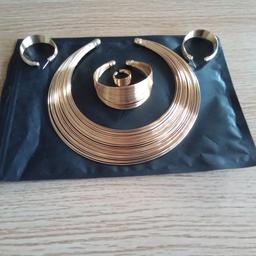AFRICAN 5 PIECE GOLD JEWELLERY SET. NECKLACE, BRACELET, EARRINGS, RING, BRAND NEW.
COLLECTION/CASH ONLY.
LEIGH ON SEA, ESSEX.SS9
