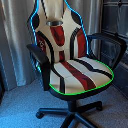 Comfortable gaming chair with RGB light system integrated (running off USB charge). Chair does not go up and down but otherwise is like new. Sanitised and barely used. Usually retails at around £90.