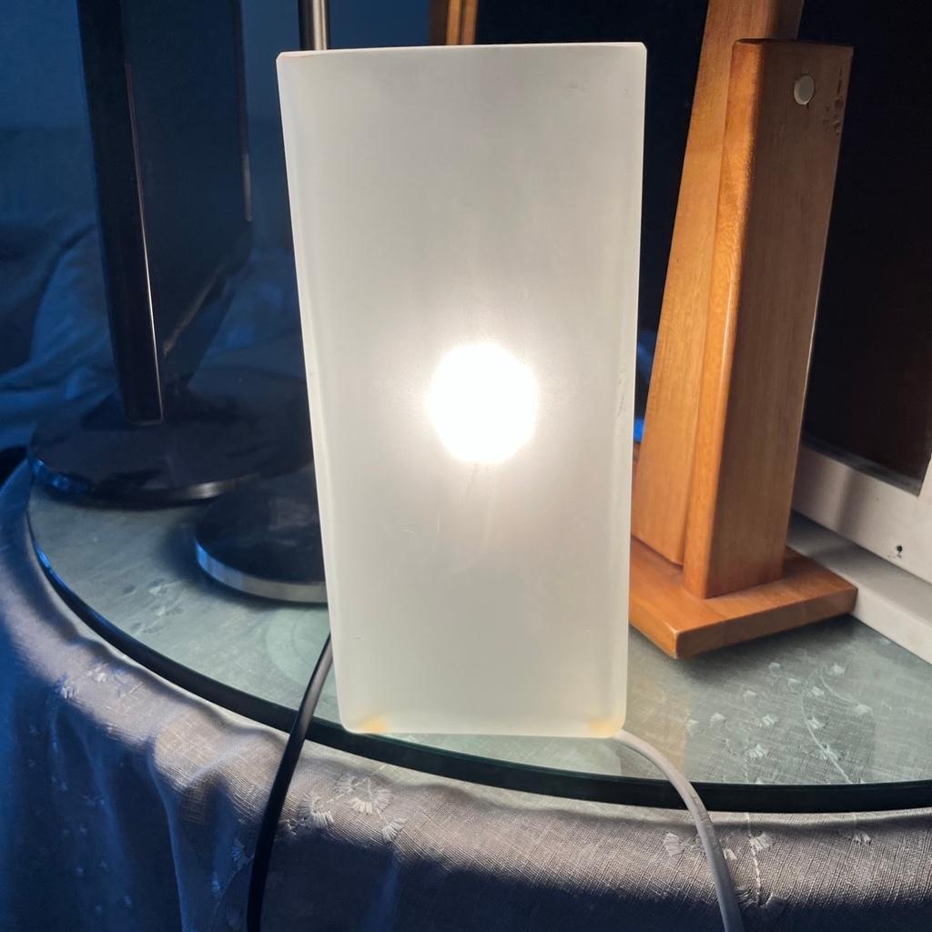 Opaque squared glass table light can be used on bedside tables or occasional tables, working lightbulb included.