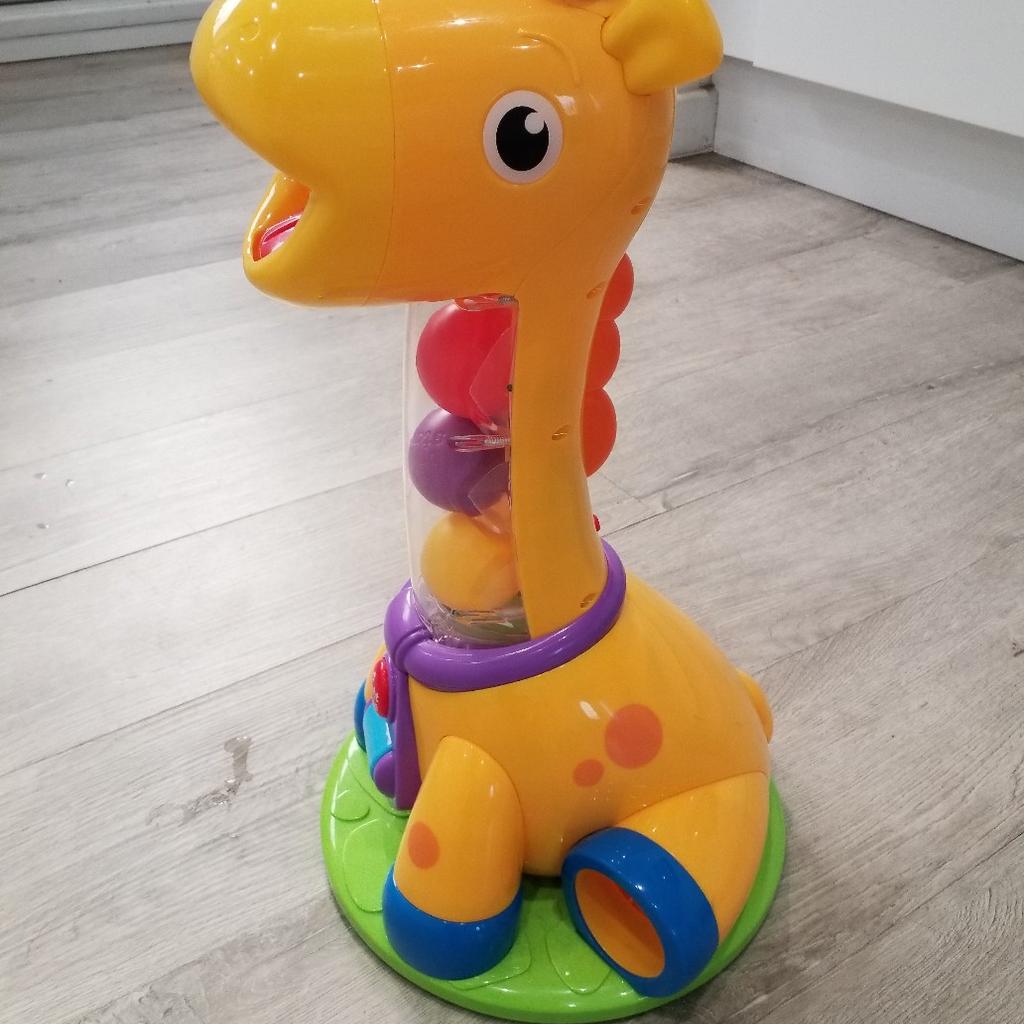 Spin and giggle giraffe ball popper.. musical in NE31 Tyneside für 15 ...