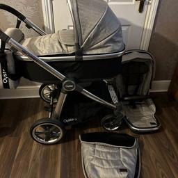 In excellent condition

Oyster 3 Bundle
Includes: Chassis, Carrycot, Seat unit, Footmuff, Changing bag, Rain covers, Oyster capsule car seat, Car seat adaptors, Changing bag

Isofix base (Brand new never opened)

Have the faux fur plush seat liner for the seat unit which I bough separately. Happy to include for free.

Great travel system, you can have the seat unit forward and rear facing position

Foldable with the seat unit

Minor marks and scratches from normal use on the chassis and car seat