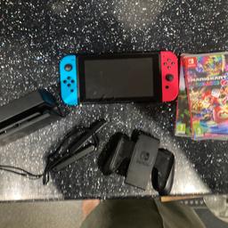 Nintendo Switch 
No scratches 
With 2 games
Unfortunately no charger 
Smoke and pet free home