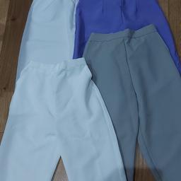 4 pairs half elasticated trousers with pockets. polyester crop trousers