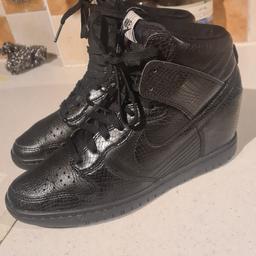 Womens Nike dunk sky high wedge  size uk6.  Xlnt condition 1st 2c will buy. See photos for condition size materials colour flaws etc. Cash on collection or I can offer free local delivery within five miles of my postcode. Postage is £4.55 via Royal Mail 48hr tracked delivery. Listed on five other sites so it may end abruptly. Don't be disappointed. Any questions please ask and I will answer asap.