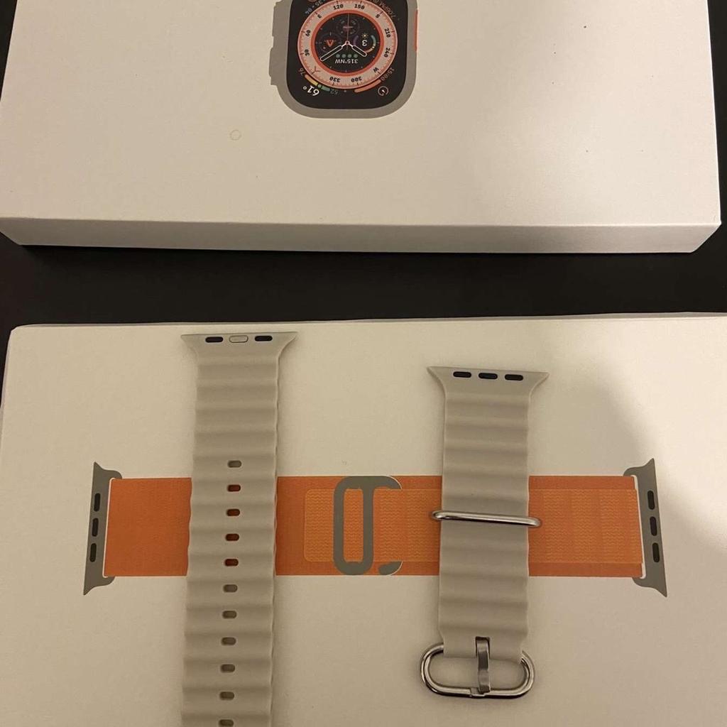 Apple Watch ultra opened pristine condition 49mm titanium, white wrist strap