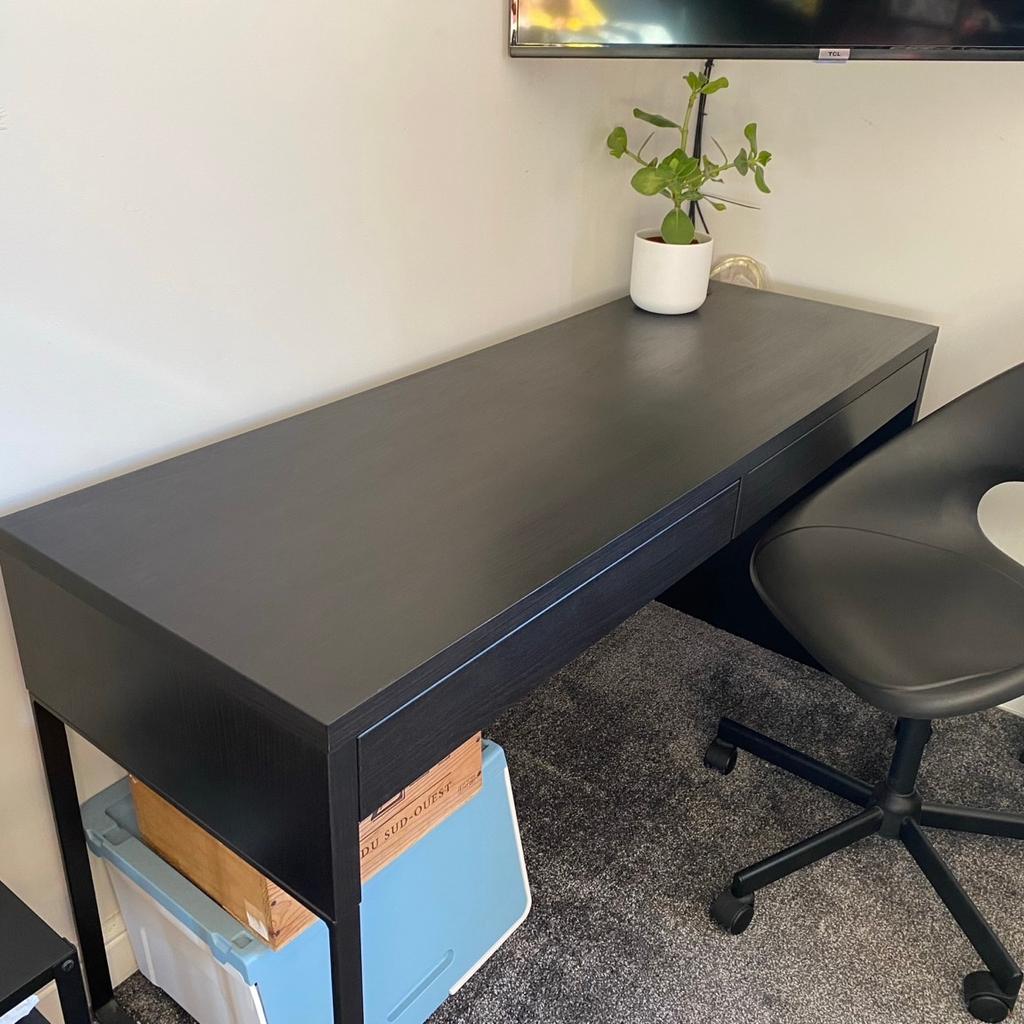Black ikea desk with two drawers.
Black swivel chair, height adjustable and with wheels.
Both great condition. Only issue is the drawers base! One side has been glued already and as you can see in the pic the other one has dipped - common occurrence in these kinds of drawers.
Desk has computer cable hole to the right side.
Open left side with metal leg as feature.
Great desk however no longer needed and just taking up space we don’t have.
Both still for sale on ikea website if you need more spec. Desk - Micke and swivel chair - ELDBERGET / MALSKÄR
Collection only, happy for you to come and view first if you want to.
Beighton