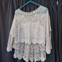 Lovely lace design top. Size M