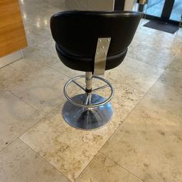 4 black leather kitchen stools. Adjustable heights with stainless steel base and support