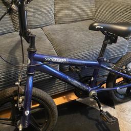 Kids shockwave bike ages 5 upwards  condition good few scratches and wear from stickers all works perfect
