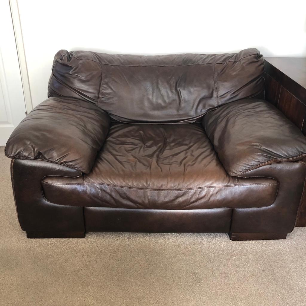 Used but still in really good condition, brown leather cuddle chair and footstool from DFS.The foot stall has plenty of storage space to keep your living room tidy. The handle is broken but could easily be fixed and is still usable as it is. Couple of marks on both but nothing major. Extremely comfy but HEAVY, will require 2 people to move. Chair height 52 1/2 inches / 134 cm, depth 41 inches / 104 cm, height 28 inches/ 72 cm ( back cushion is a couple of cm taller )
Stool height 16 inches / 42cm, depth 25 inches / 64cm, length 35 inches / 89 cm.
Can be sold separately
