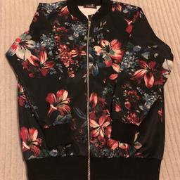 Colour: black & multi

Style: bomber

Size: 16

Free to collect or delivery at buyer’s cost (£4.69 Royal Mail signed for)