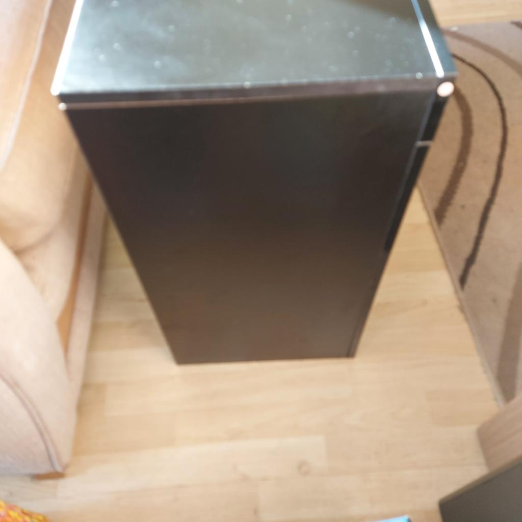Black TV/Gaming Unit with Cupboard. Great Condition
4 shelves ideal for Gaming and TV
Also has lower cupboard as per pic

L = 100 cm
D = 35cm
H = 65cm

Can deliver locally as built for £5 within 5 mile radius