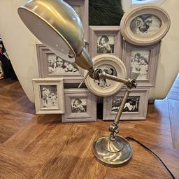 Lovely condition brass reading lamp. This is a heavy quality lamp and is in working condition it just needs a new bulb.