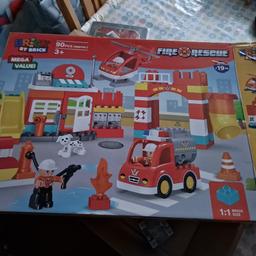 Fire rescue set. like Lego Duplo sets. As new. (box a bit tatty) Cost £20