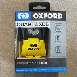 Oxford Quartz XD6 motorbike scooter Disc Lock- brand new
Yellow/Black
Unopened / Original Packaging

Can collect from close to Kidbrooke station

The Quartz XD6 is a motorcycle and scooter disc lock.
Key Features
• Ideal for all modern motorcycles.
• Twin spar lock chassis for double strength & cut resistance.
• Alloy construction with 6mm hardened locking pin.
• Unique design; includes minder cable & attachment eye.