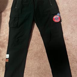 Brand New Without Tags - never been worn 

Elastic adjustable waist & ankles,
2 zip up pockets,
2 box pockets lower,
Mercier logo on pocket & lower right leg 

90% nylon +
10 % elastane 

£70, free postage included