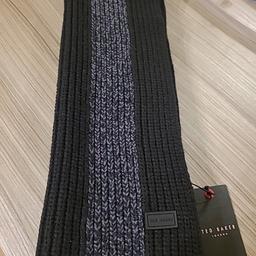TED BAKER Ribbed Striped Black Scarf Mens RRP £40 BNWT

Elevate your style with this exquisite TED BAKER scarf, designed exclusively for men. Crafted with attention to detail, this accessory is perfect to complete any outfit and make a fashion statement. The Brand's signature style is evident in this scarf, making it a must-have for any fashion-forward man.

This scarf is a versatile piece that can be worn in various styles to match your personal taste. The premium quality of this accessory ensures durability, making it a long-term investment. Add this TED BAKER scarf to your collection today and experience the perfect blend of style and functionality.