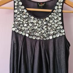 River Island Sequin Top UK 10.

Bought but never used due to pregnancy.  Would make a great party dress or for going on holiday and escape this cold!  All sequins are present & added sparkle as you enter any event and literally shine!

Can be posted out for extra costs of £3.95, UK mainland as well as combining with other items up too 2kg in total.  Royal Mail Small parcel.