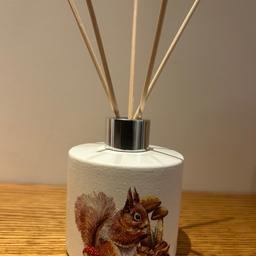 Handmade 
Glass reed diffuser 
Hand painted & decoupaged with woodland squirrel.  
Comes with wooden reeds 
Fill with your favourite fragrance 
Refillable 
Similar ones on Etsy  site £17:50 
Listed on multiple sites
From a smoke free pet free home