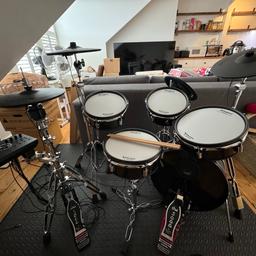 Full drum kit setup with drum throne. Only 6 months old - selling because I’m moving overseas! Great as first kit or for beginners looking to upgrade. 

Highly customisable - independent stands make it easy to arrange things as you like, and the module has hundreds of configuration options as well as lots of presets.  

Setup includes: 
- VAD307 kit (see Wembley music Centre website for full product details)
- Snare stand
- DW 5500TD Hi hat stand and pedal
- DW 5000 Kick drum pedal
- Gibraltar velvet motorcycle/saddle drum throne with removable backrest. 

Full setup (kit and throne) purchased for £3,000 from Wembley Drum Centre in June 2023. Very lightly used (maybe only a dozen times as I travelled a lot last year) so in excellent “nearly new” condition. Offering for £2,000 or best offer!  

I also have some anti-vibration floor mats which I’m happy to throw in - great for apartment living! 

Collection from Haringey Green Lanes N4 before the end of January.