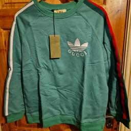 WhatsApp me on 07889333682 for any info or questions 

Gucci x Adidas Top - New - Size Large