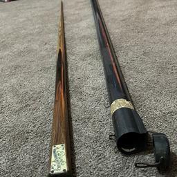 This is is a first edition Eureka Cue. It has a hand-spliced stripey ebony butt, with four hand-spliced pieces of tulipwood.

The Eureka Cue was one of the best known cues manufactured by Burroughes & Watts.  Eureka Cues were produced for a period of almost 35 years, from about 1933 through to 1967, when Burroughes & Watts ceased business.

The Eureka Cue was one of the first cues sold with a metal ferrule already fitted.  The Burroughes & Watts trade catalogues proclaimed that the ferrule was "designed to take, without stress, the impact of forcing shots".

is is a first edition Eureka Cue. It has a hand-spliced stripey ebony butt, with four hand-spliced pieces of tulipwood.

The Eureka Cue was one of the best known cues manufactured by Burroughes & Watts.  Eureka Cues were produced for a period of almost 35 years, from about 1933 through to 1967, when Burroughes & Watts ceased business.

The Eureka Cue was one of the first cues sold with a metal ferrule already fitted.  The Burroughe