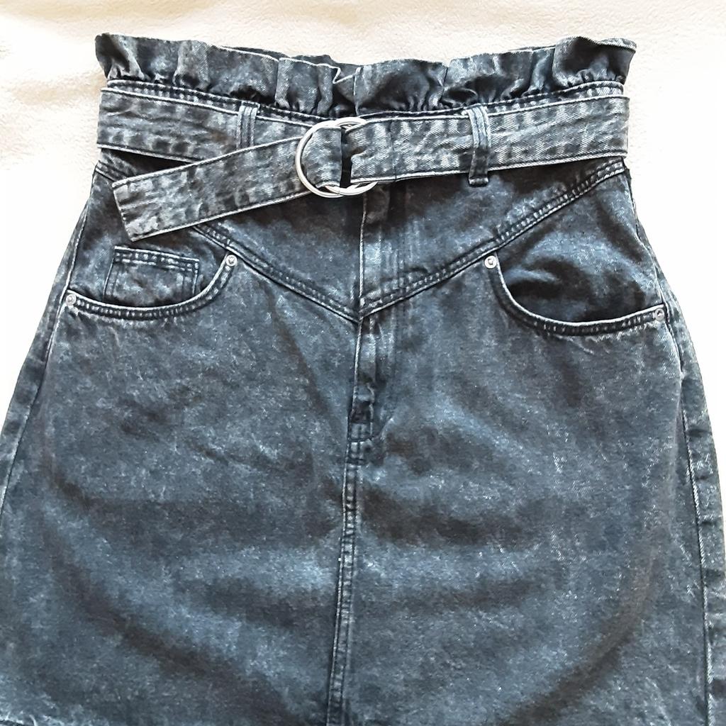 high waisted , with belt and front pockets, denim , hardly been warn