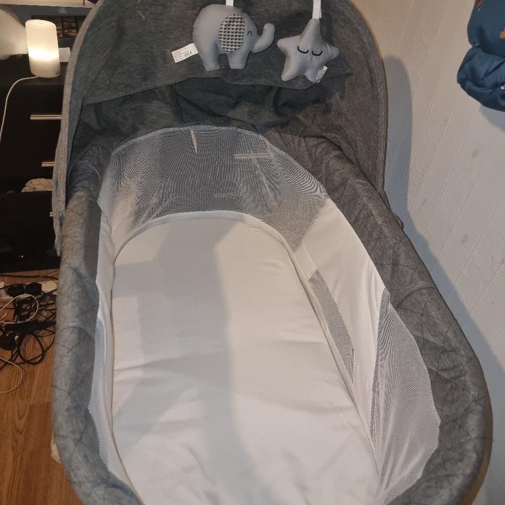 like new puggle vibrating cott, my baby has only slept in it once. Has storage underneath.