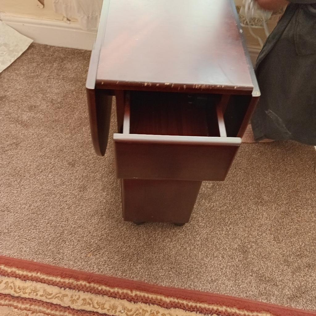 brown in colour wooden table in very good condition