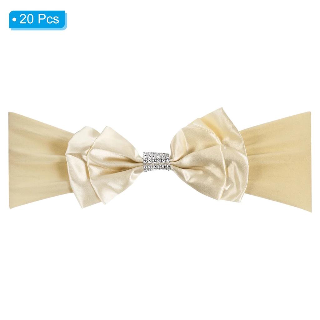 Color: Champagne; Material: Polyurethane Elastic Fiber; Suitable for: Chair Backs with 31-41cm Width; Unstretched Size: 31 x 12 cm / 12.2 x 4.7 inch (L*W); Packing List: 20pcs x Stretch Chair Sashes Bows

Advantage: The chair sash bow is made of elastic spandex material, which is not easy to shrink and deform after washing, and is easy to wash and dry. The chair sash comes with double satin bows, and the vibrant solid color design adds sophisticated elegance to gifts, crafts, or banquet halls.

Instruction: The elastic band of the chair cover does not need to be tied with a bow, it only needs to be stretched on the chair cover, which is convenient to use.

Application: Banquet chair sash fits banquet chairs and folding chairs decorations for weddings, parties, celebrations, graduations, special events, and banquet events, makes the chair more tidy and beautiful, and is great for party decorations

Open packet but unused