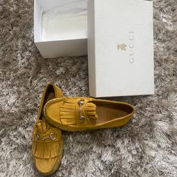 Beautiful mustard genuine Gucci horse bit shoes. Size 33 and comes with box and shoe bag.