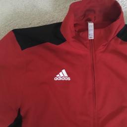 Red Adidas tracksuit top in goo used condition, little mark near pocket,side pockets front full zipper, also has hidden zipper pocket in the inner back of mesh lining , from a smoke and pet free home cash and collection only please feel free to check out my other items