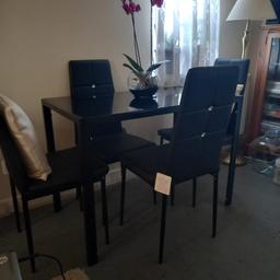 Black Glass with Four Dining Chairs.
Length:3ft x Width 2ft x Depth 2ft.5in.has a few barely visable didn't notice. reason price. £50.00 .Buyer Collects.