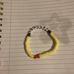 Red, gray, yellow and red teacher bracelet